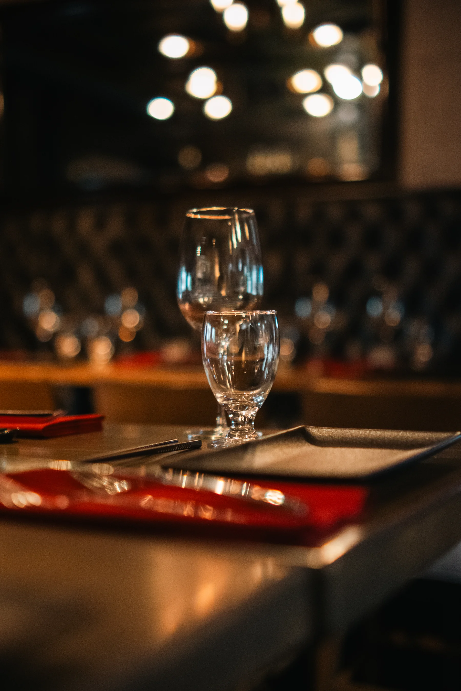 A table set for dinner in Prime’s softly lit dining room