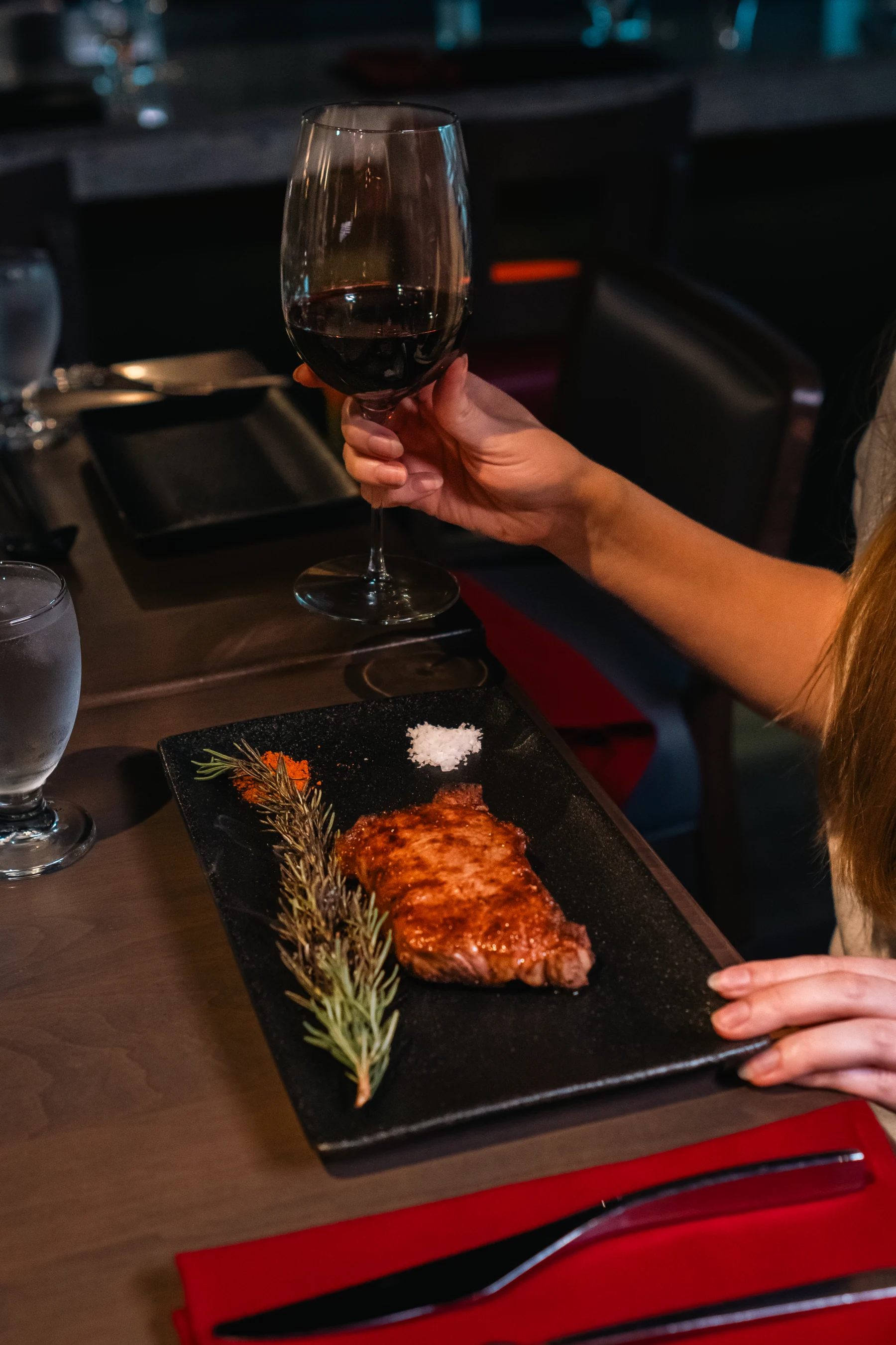 Steak and a glass of wine at Prime