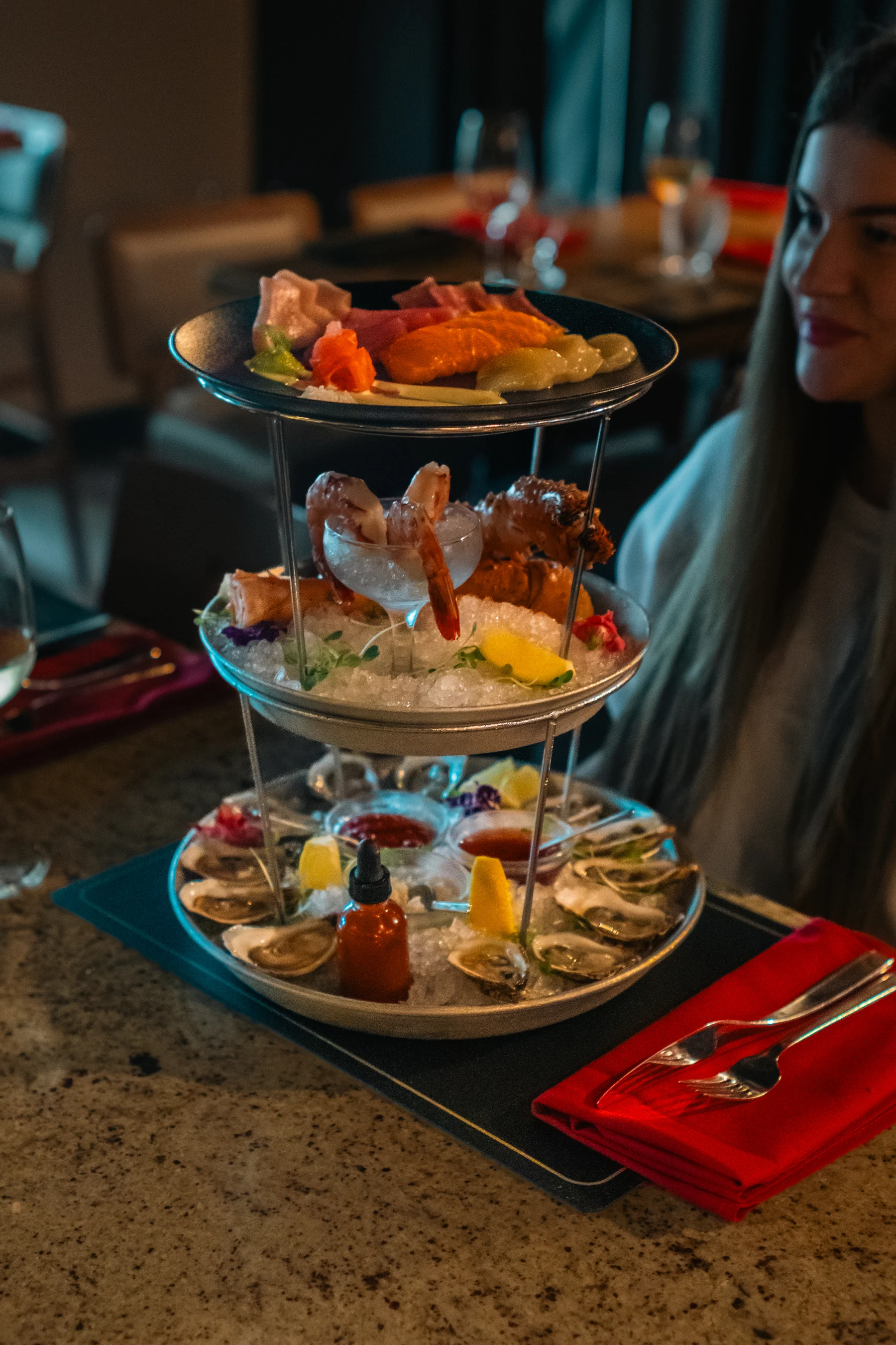 Guests sharing a raw bar tower at Prime