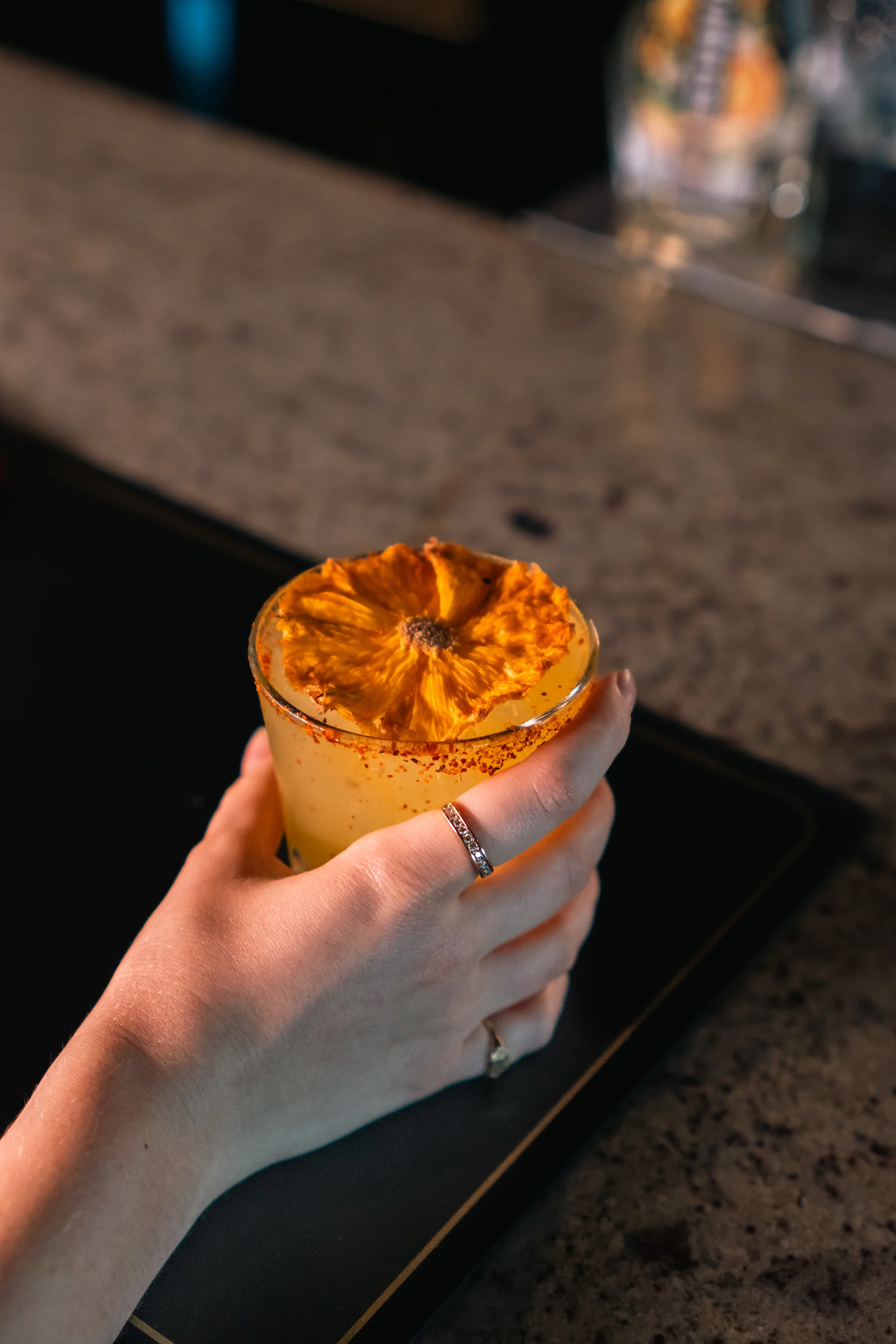 A freshly made cocktail held at Prime